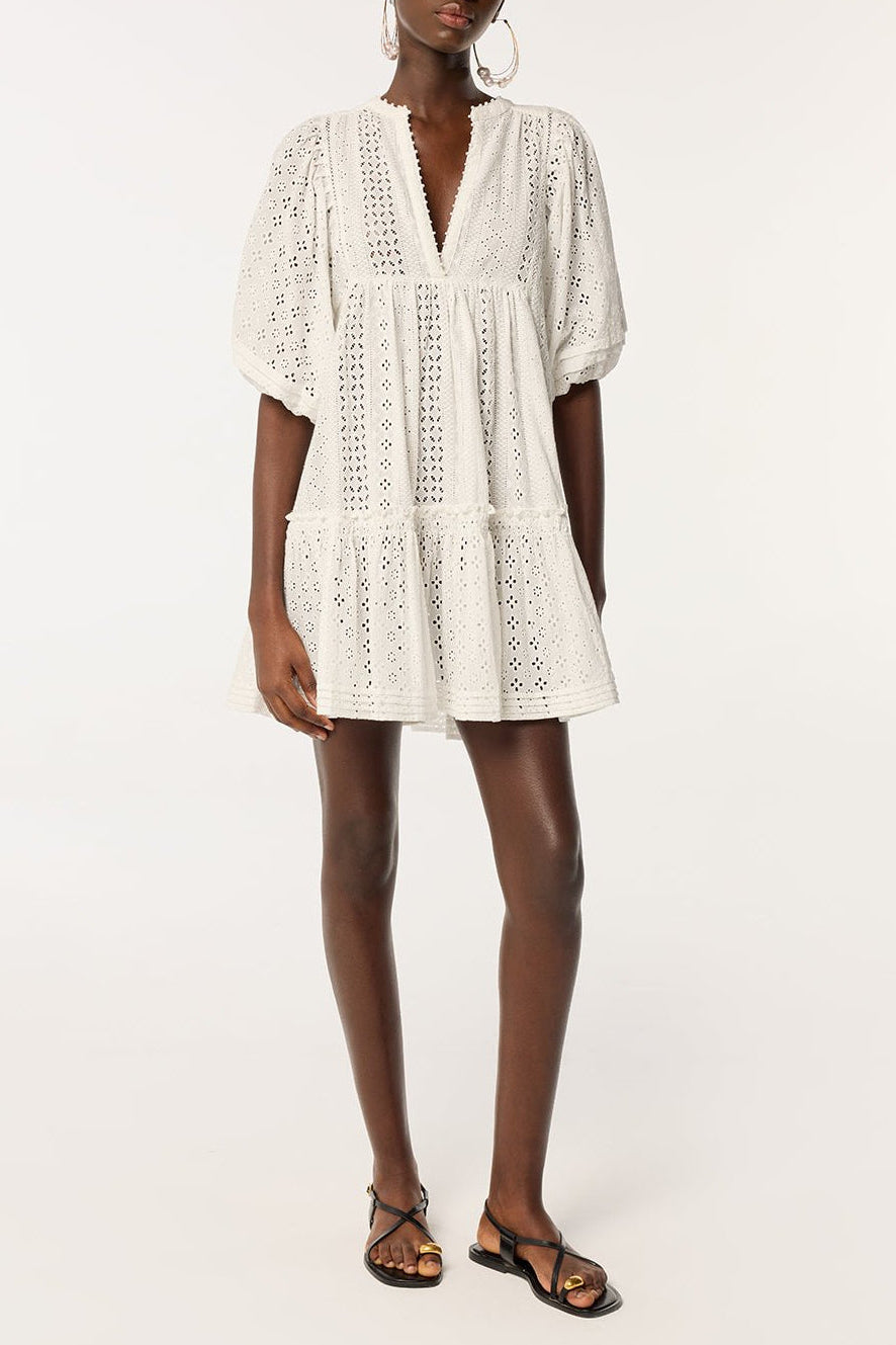 Poupette St Barth Mini Dress Aria in natural white fabric, sleeveless with a fitted bodice and flowy skirt, perfect for summer wear.