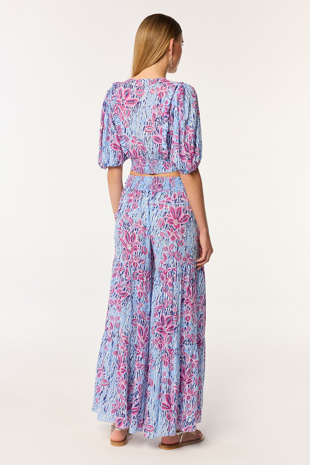 Blue viscose pants from Poupette St Barth's Pant Soledad collection featuring exotic forest print.