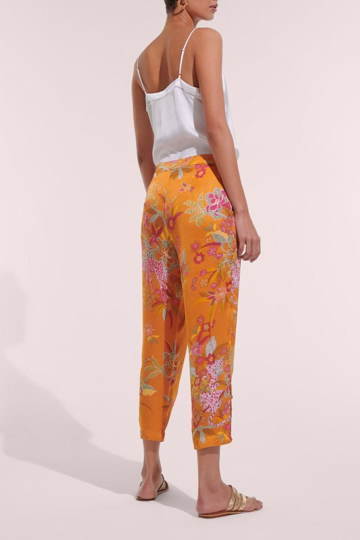 Poupette St Barth orange Leo forest print pants with relaxed fit and elastic waistband, casual and stylish women's pants.