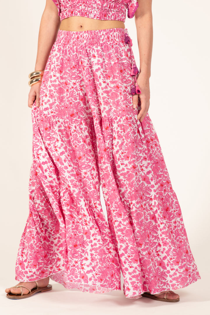 Pink Aquaflora pants from Poupette St Barth's Soledad collection, featuring lightweight, flowy fabric and relaxed fit.
