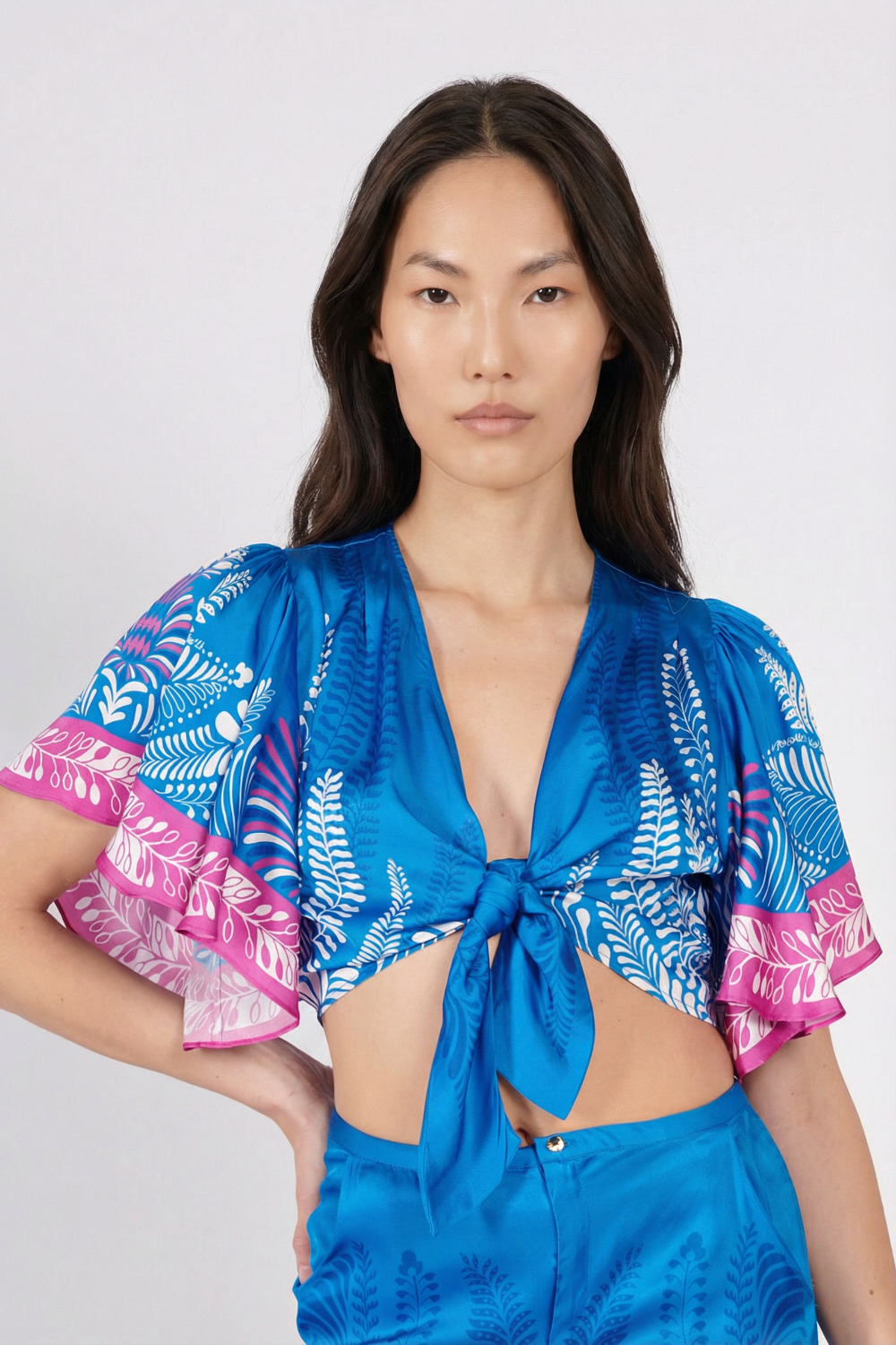 Blue Oolong Top Rose shirt by Poupette St Barth, featuring floral design and lightweight fabric.