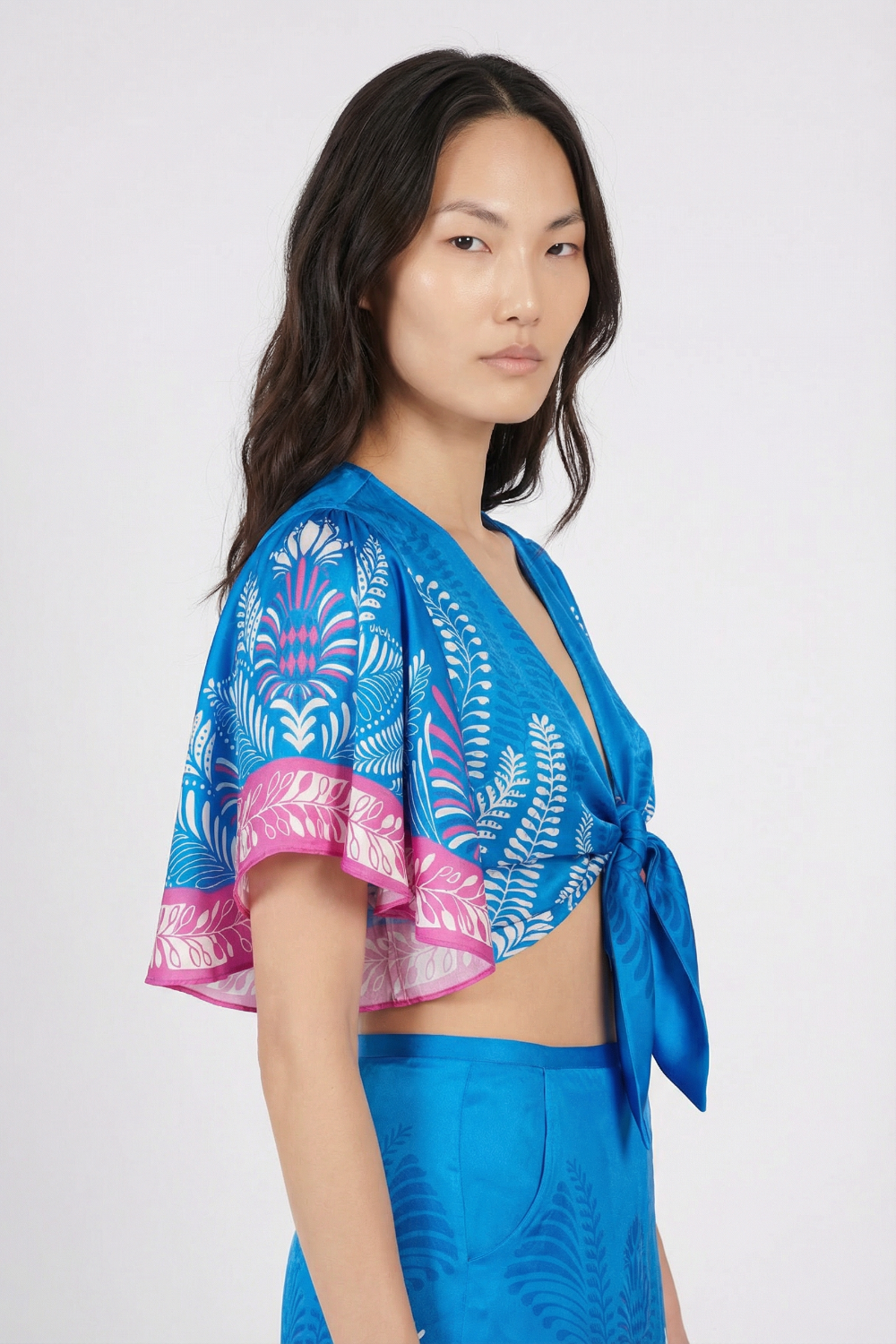 Blue Oolong Top Rose shirt by Poupette St Barth, featuring a stylish floral design and lightweight fabric.