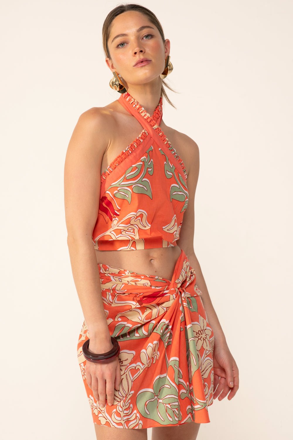 Poupette St Barth Top Suma Orange Ritual shirt featuring a relaxed fit and vibrant orange color, casual style for warm weather.