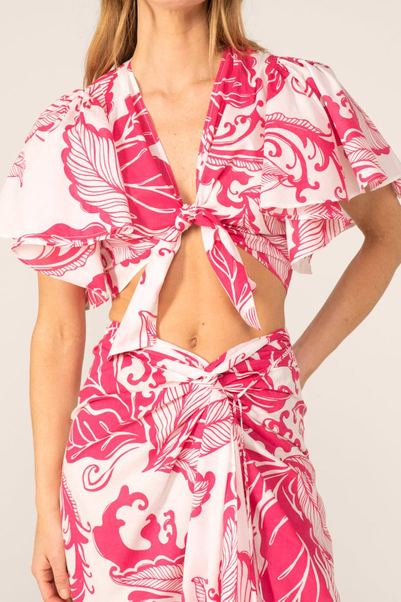 Pink Reef Wave top – Top Rose by Poupette St Barth, front view with knotted front and flutter sleeves