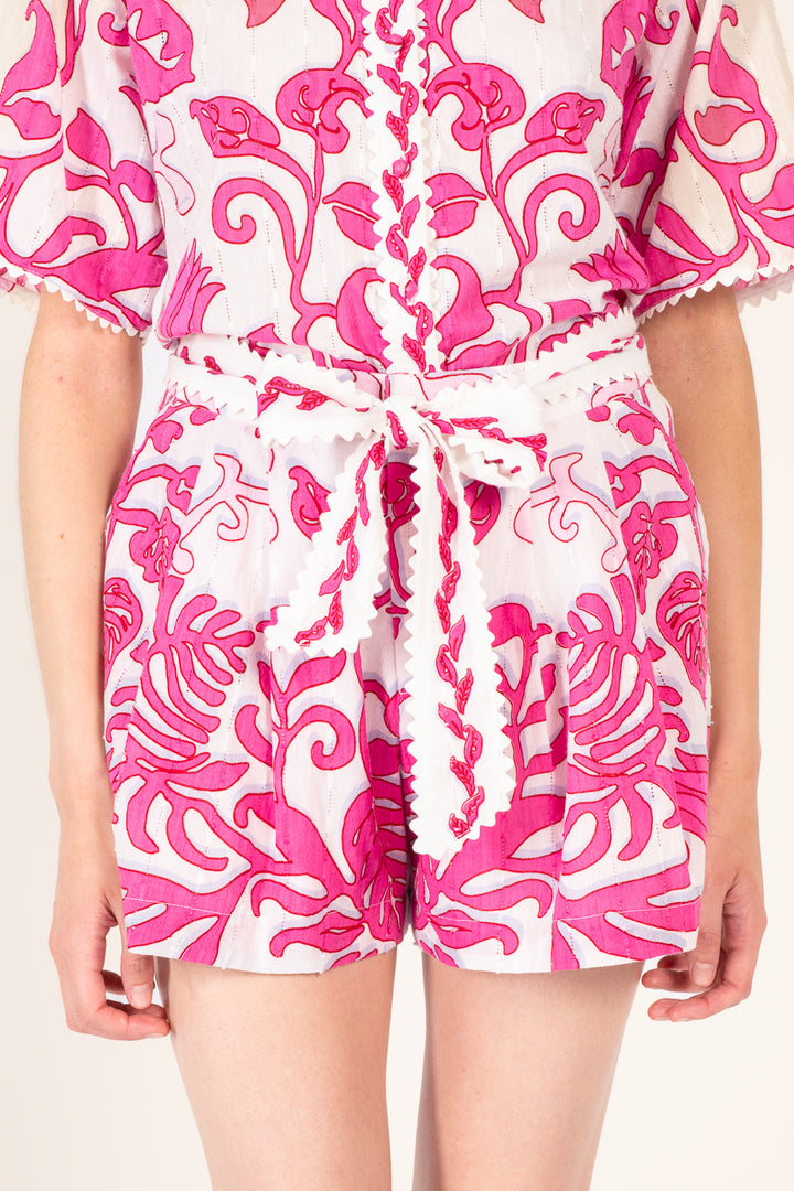 White and pink Poupette St Barth Chantal shorts with a relaxed fit, featuring a comfortable, stylish design ideal for casual wear.