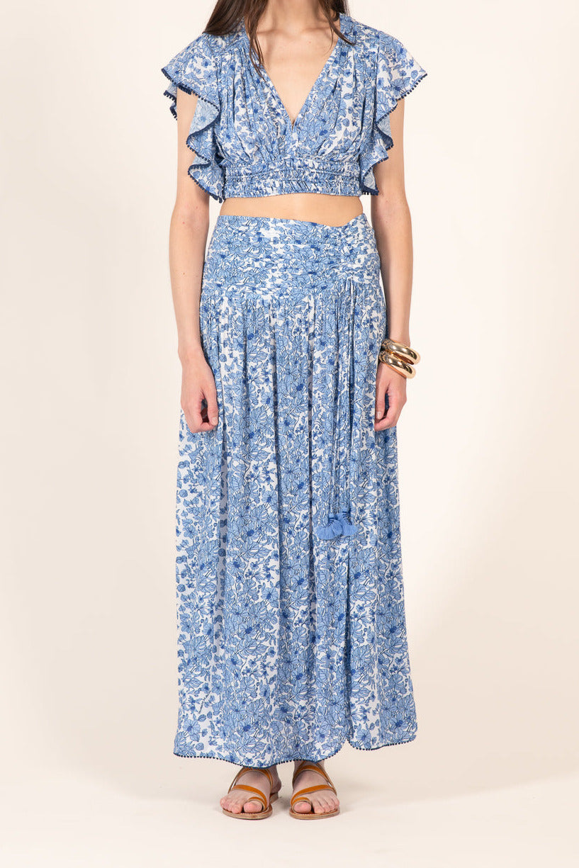 Blue Aquaflora long skirt by Poupette St Barth, featuring lightweight viscose fabric and flowing silhouette.