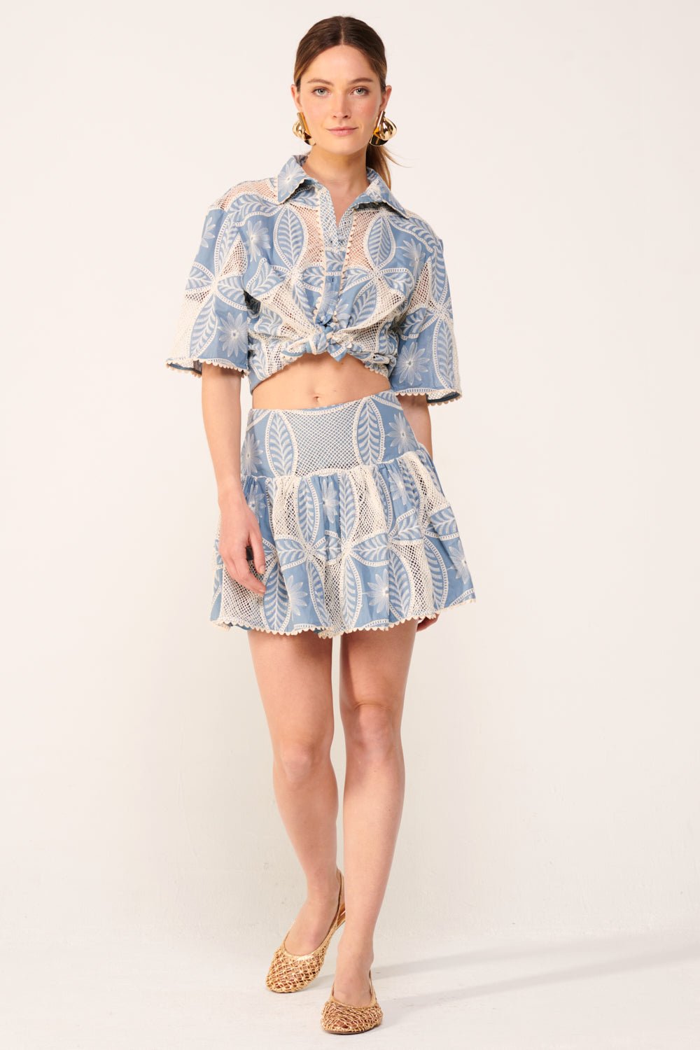 Blue Mini Skirt Colleen by Poupette St Barth featuring a colorful mandala pattern on lightweight fabric.