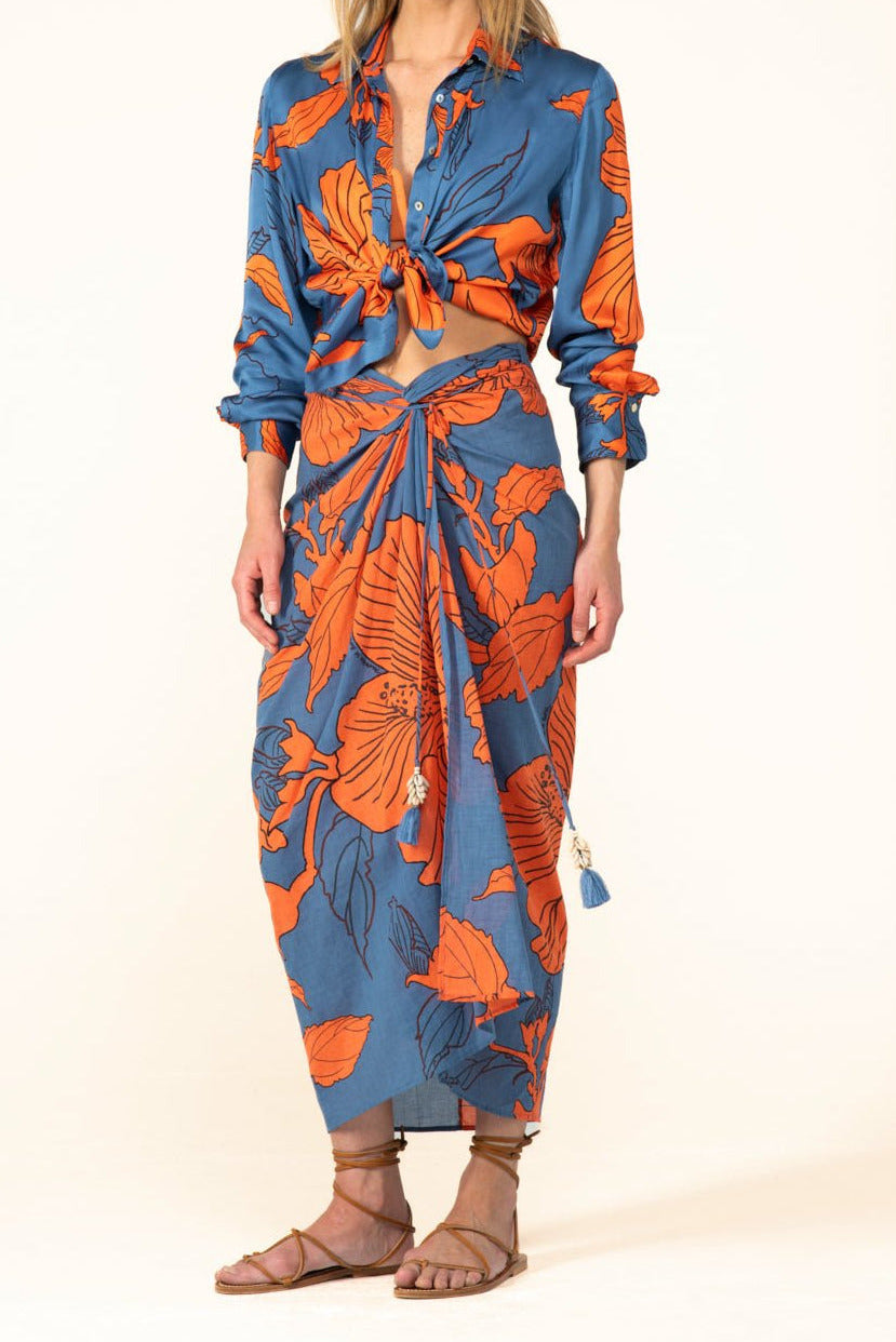 Blue hibiscus cotton long skirt by Poupette St Barth, featuring a flowing design and lightweight fabric.