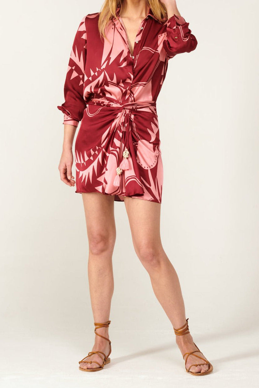 Poupette St Barth Tilda Mini Skirt in Bordo Oasis, made of viscose satin, showcasing its stylish, flowy design and rich color.