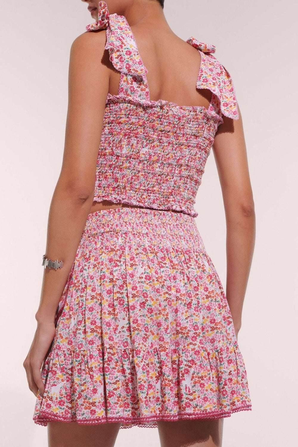 Pink Jardin Mini Skirt by Poupette St Barth, lightweight viscose skirt with a stylish mini length and vibrant floral pattern.