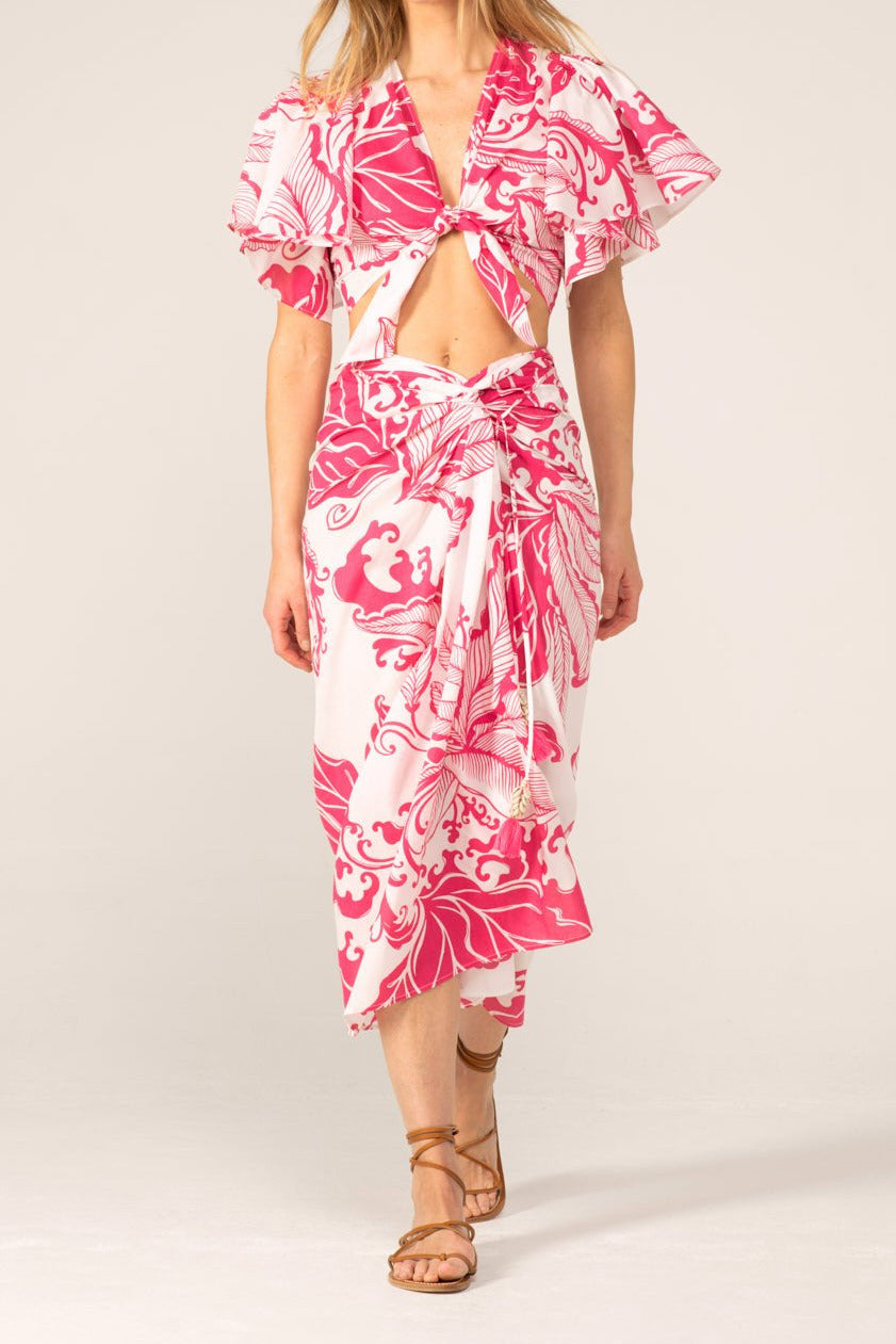 Pink reef wave long cotton skirt Uma by Poupette St Barth, flowing design with vibrant pink and wave pattern.