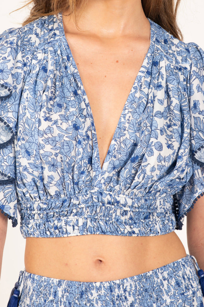 Blue Aquaflora top – Top Pearl by Poupette St Barth, front view of V-neck crop top with ruffle sleeves