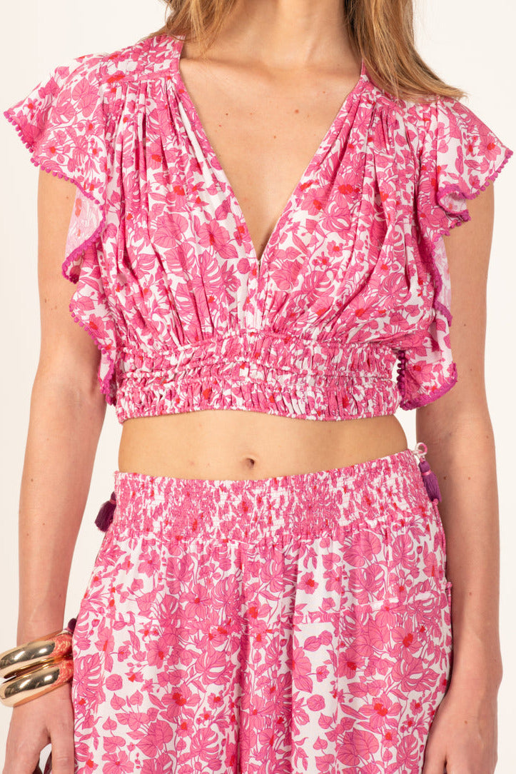 Pink Aquaflora top – Top Pearl by Poupette St Barth, front view of V-neck crop top with ruffle sleeves