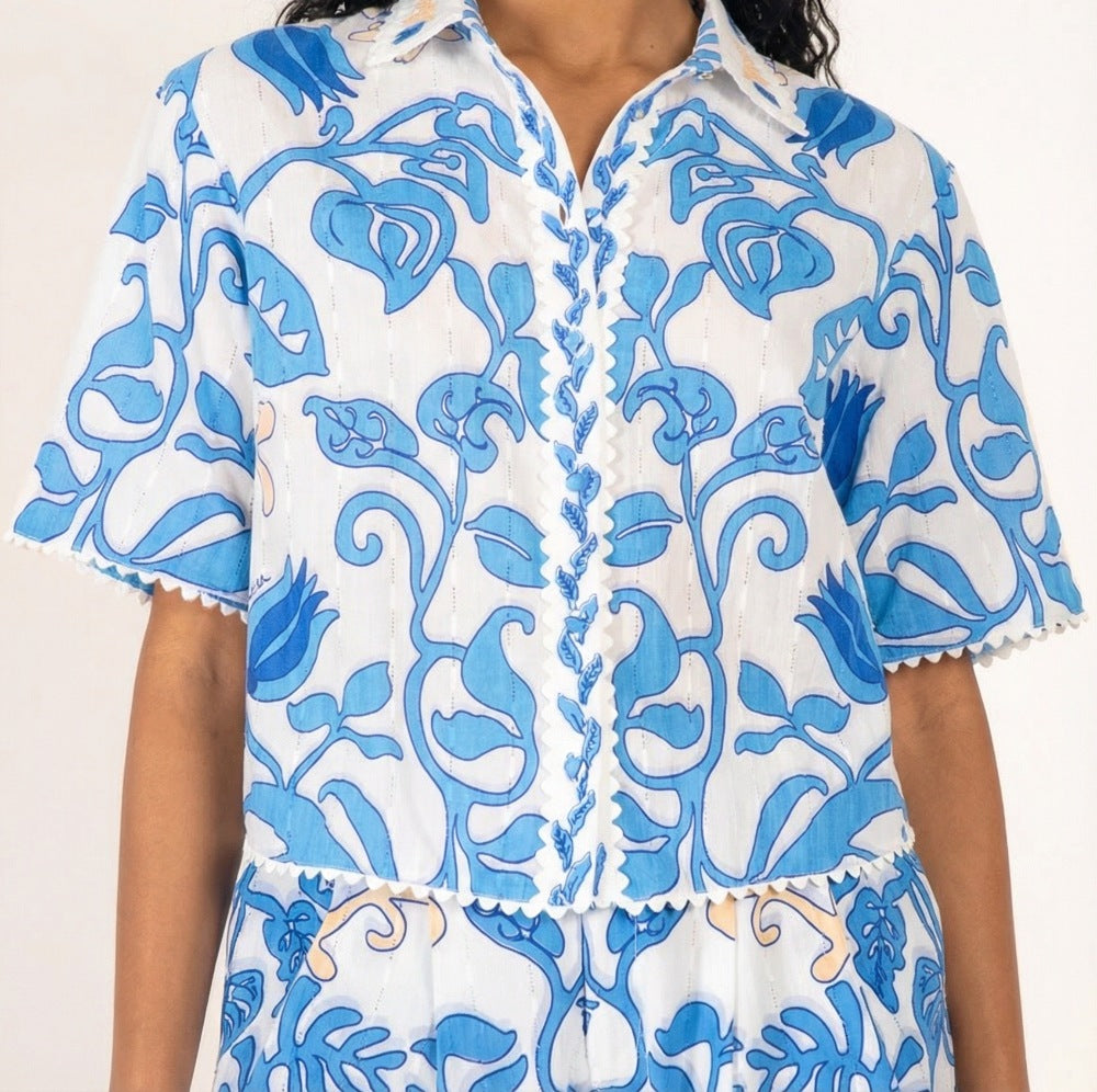 White and blue cotton eyelet stripe shirt from Poupette St Barth's Java Ritual collection.