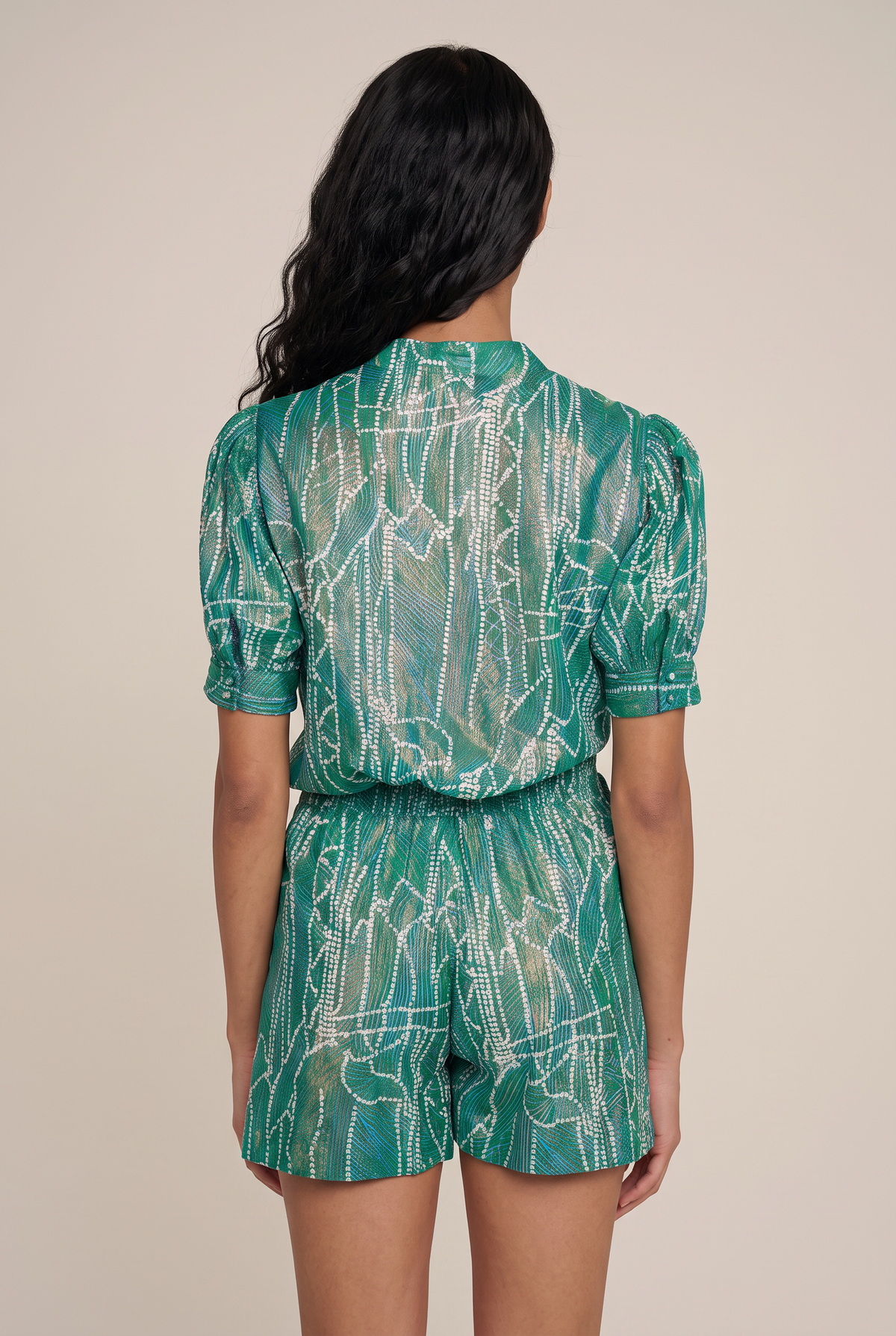 Green Short Jumpsuit Livia by Poupette St Barth featuring a relaxed fit and stylish design, perfect for warm weather wear.