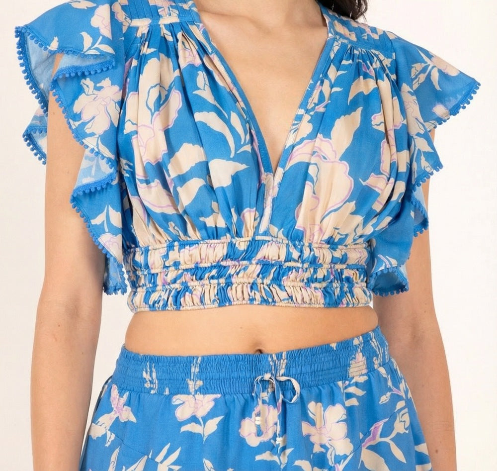Blue Palm Beach viscose top from Poupette St Barth featuring a relaxed fit and tropical-inspired design.