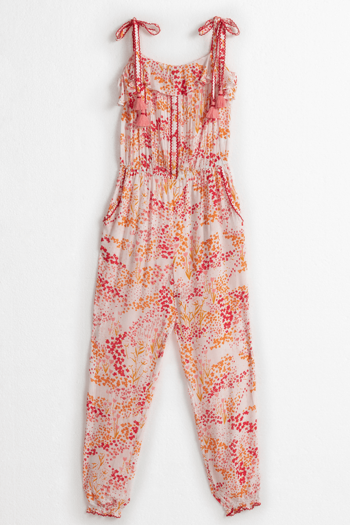 Kids long jumpsuit Astra by Poupette St Barth in white and pink tulip design, featuring a comfortable fit and playful style.