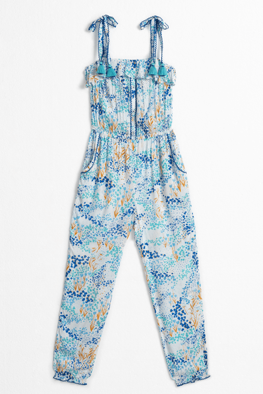 Kids long jumpsuit Astra by Poupette St Barth in white and blue tulip print, featuring a comfortable fit and stylish design.