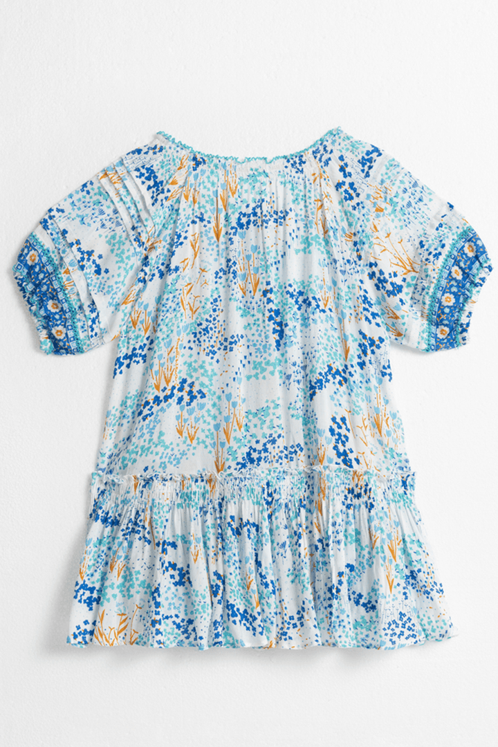 Kids mini dress Andrea by Poupette St Barth featuring a white and blue tulip pattern, shown from the back view.