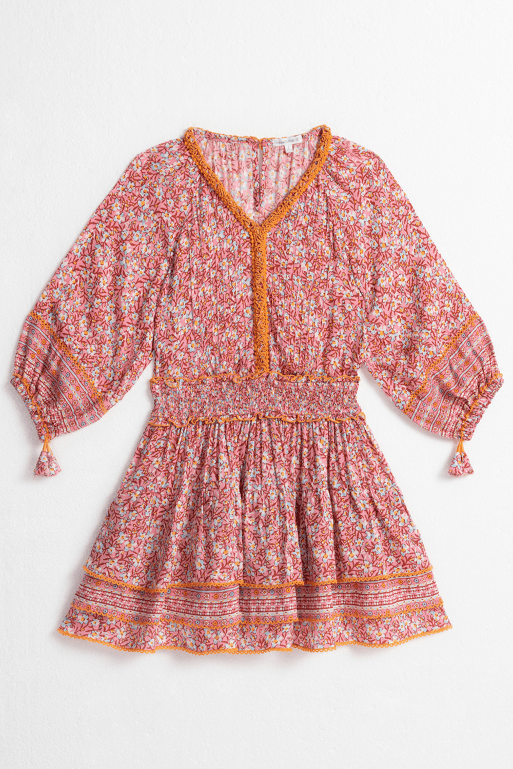 Light pink Kids Mini Dress Ariel by Poupette St Barth, featuring a charming paquerette pattern, front view.