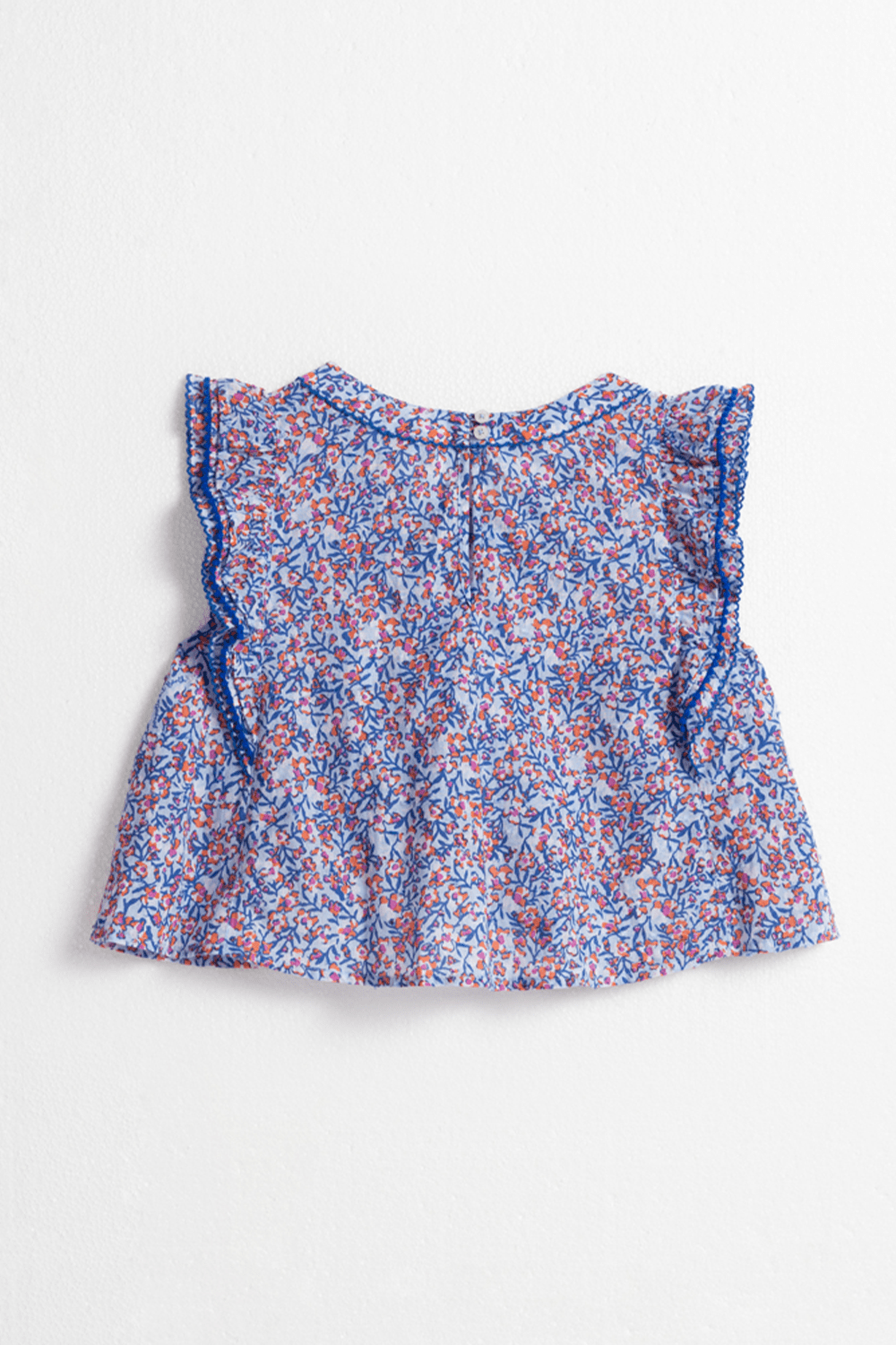 Light blue kids' top Adeh by Poupette St Barth, featuring Paquerette design, shown from the back.