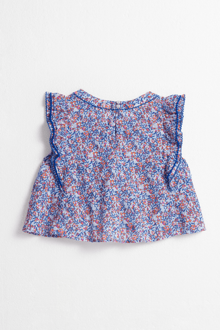 Light blue kids' top Adeh by Poupette St Barth, featuring Paquerette design, shown from the back.