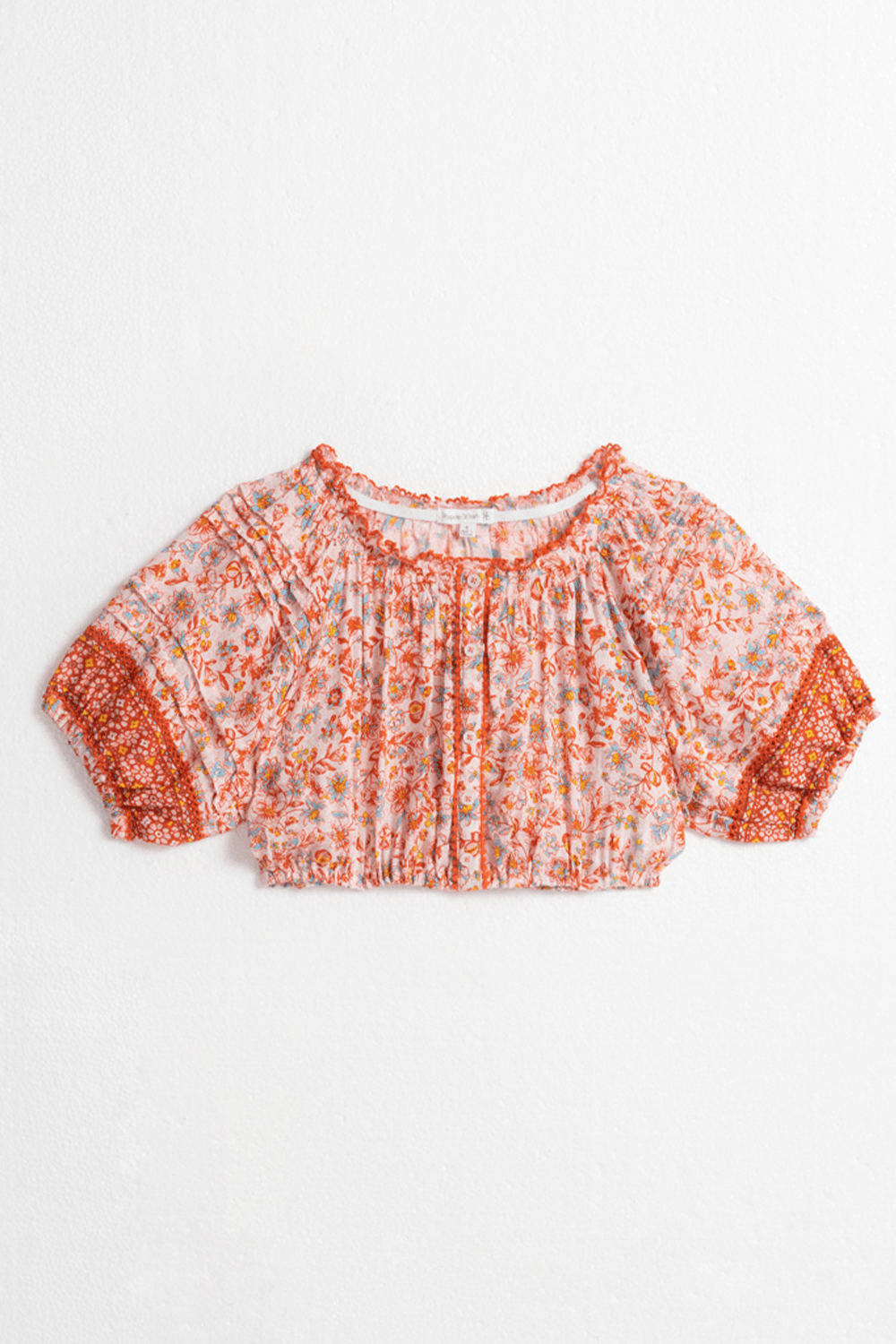 Pink Magnolia kids' top by Poupette St Barth, front view showing stylish children's shirt with floral design and soft fabric.