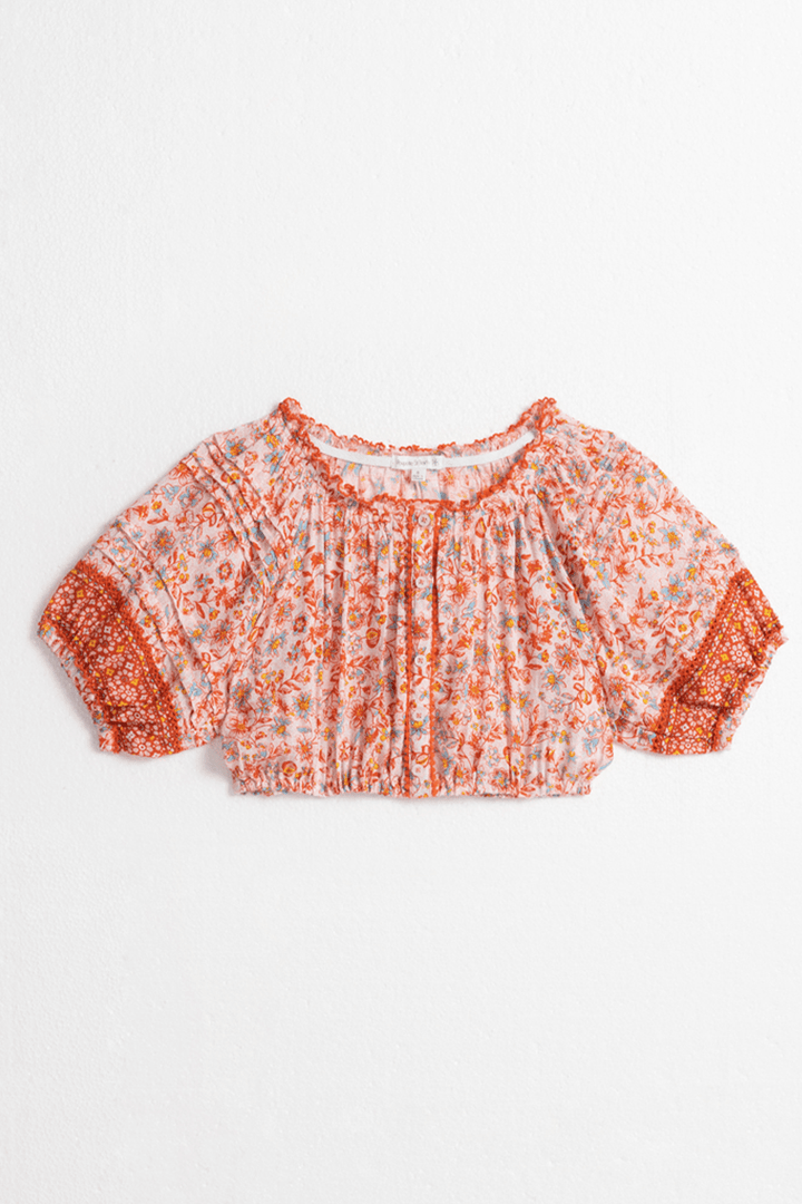 Pink Magnolia kids' top by Poupette St Barth, front view showing stylish children's shirt with floral design and soft fabric.